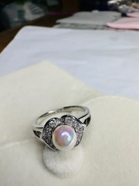 The Iridescent Pearl Bloom