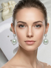 The Lumina Pearl Drop Earrings