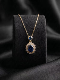 The Sapphire Sunburst Pendant